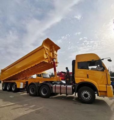 客の要求 50トンの後部ダンプトレーラー U型水力ダンプティッパーセミトレーラー