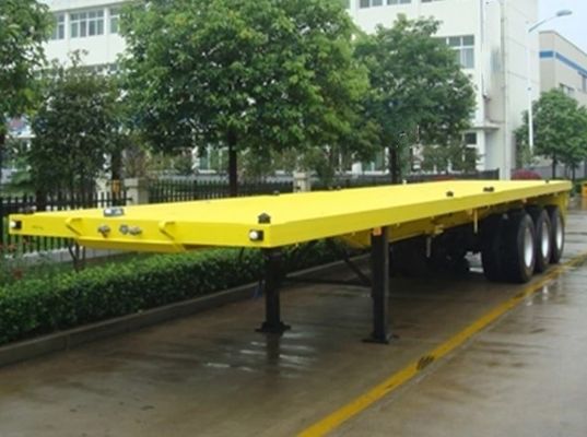 3軸20フィート40フィート平床コンテナトレーラー Q345bメインビームとカスタマイズ