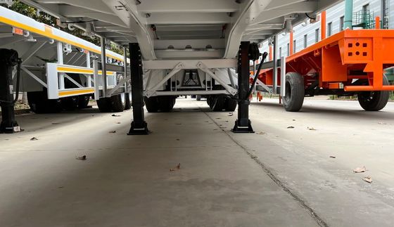 20Ft 40Ft 50Tn フラットベッド半トレーラー コンテナ・シャシーと50mmまたは90mmのキング・ピン