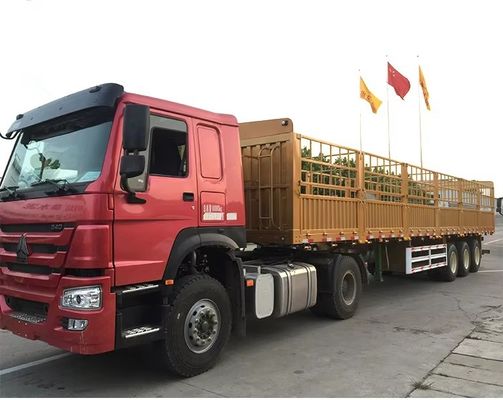 3軸のフェンス貨物トレーラー 最大重荷100トンと13000*2550*2900mm 寸法
