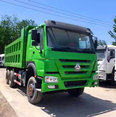 中古 HOWO 6X4 ロシアへの鉱山用ダンプトラック 手動窓と貨物タンク 5.3-6.2M